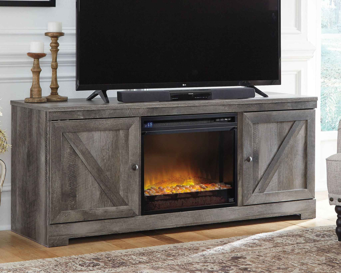 Wynnlow - 63" TV Stand With Glass/Stone Fireplace Insert - Gray