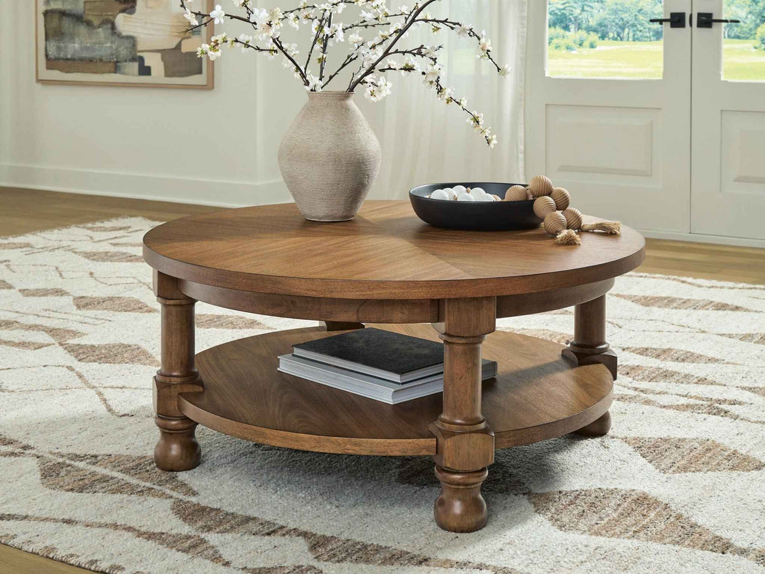 Chadworth - Round Cocktail Table - Medium Brown
