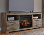 Trinell - 63" TV Stand With Glass/Stone Fireplace Insert - Brown