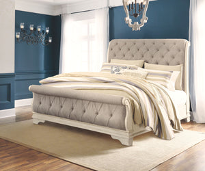Realyn Two tone 5 Pc. Dresser, Mirror, Upholstered Sleigh Bed