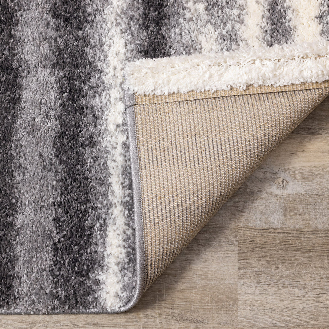 Fergus Grey White Stripes Shag Rug - Furniture Depot