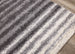 Fergus Grey White Stripes Shag Rug - Furniture Depot