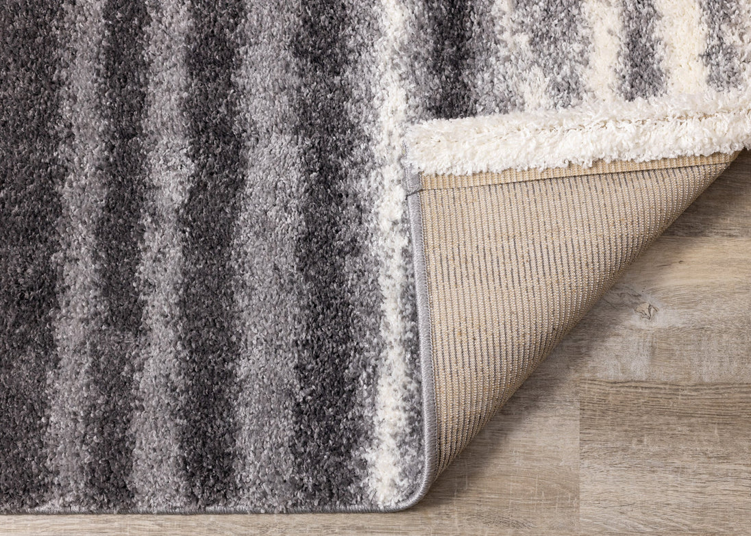 Fergus Grey White Stripes Shag Rug - Furniture Depot