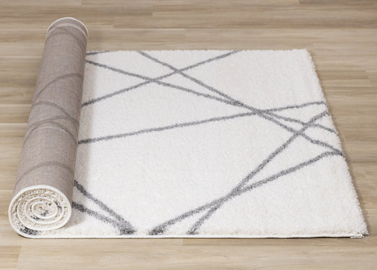 Fergus White Grey Lines Crossing Shag Rug - Furniture Depot