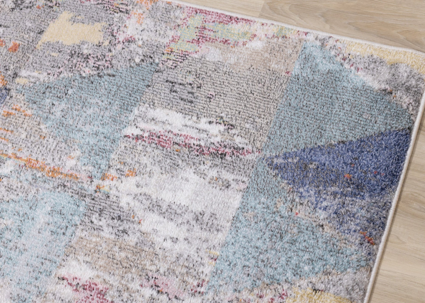 Fresco Distressed Grey Pink Blue Yellow Triangular Pattern Rug - Furniture Depot