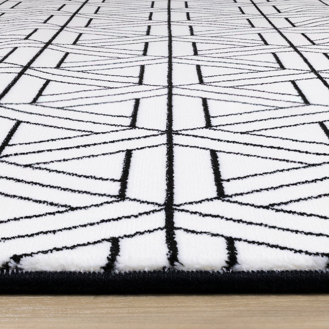 Ice White Black Interlock Rug - Furniture Depot