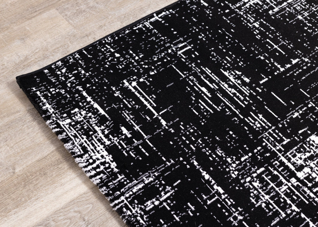 Ice Black White Distressed Rug - Furniture Depot