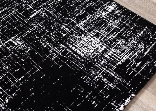 Ice Black White Distressed Rug - Furniture Depot