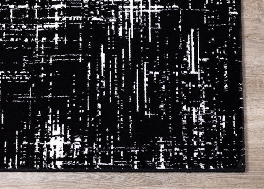 Ice Black White Distressed Rug - Furniture Depot