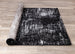 Ice Black White Distressed Rug - Furniture Depot