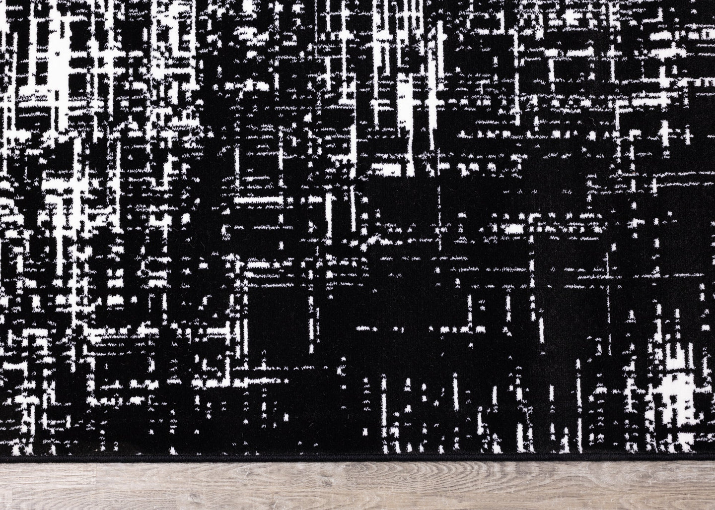 Ice Black White Distressed Rug - Furniture Depot