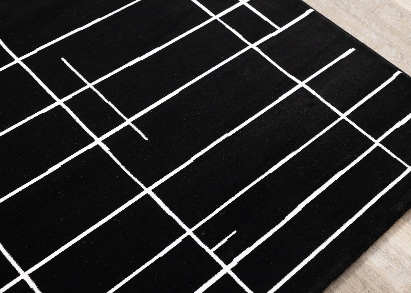 Ice Black White Lines Rug - Furniture Depot