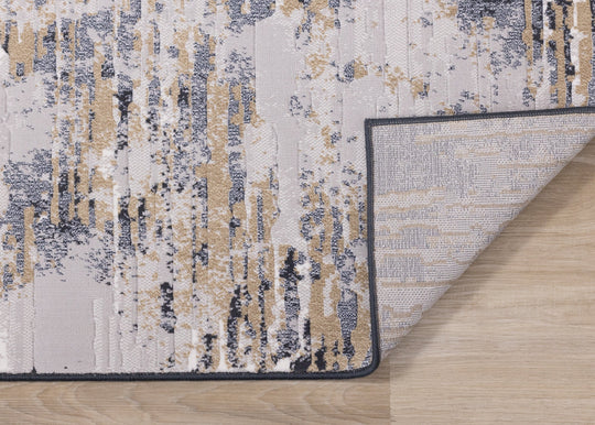 Intrigue Beige Blue Distressed Rip Rug - Furniture Depot