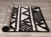 Maroq Black Cream Banded Peaks Rug - Furniture Depot