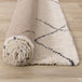 Maroq Cream Grey Uneven Trellis Rug - Furniture Depot