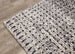 Maroq Grey White Black Distressed Dots Rug - Furniture Depot