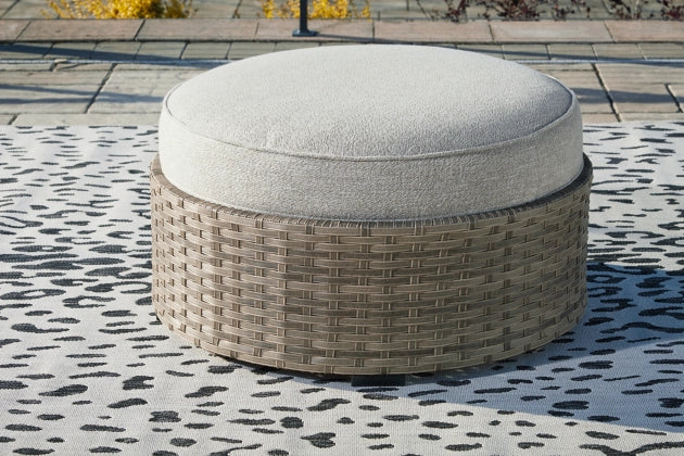 Calworth Outdoor Ottoman with Cushion - Furniture Depot