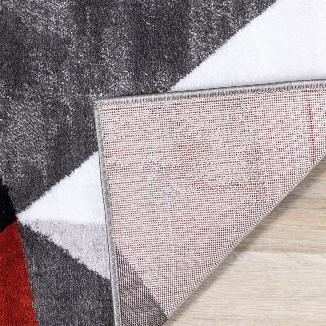 Platinum Red Grey Black Triangles Rug - Furniture Depot