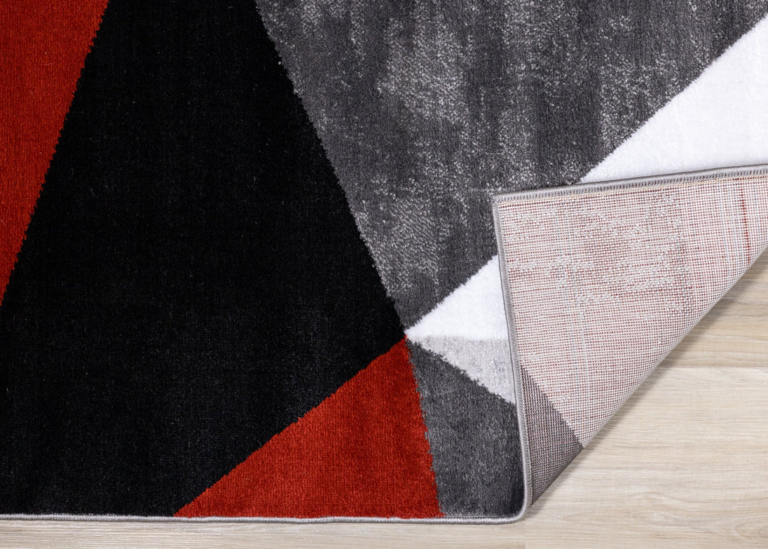 Platinum Red Grey Black Triangles Rug - Furniture Depot