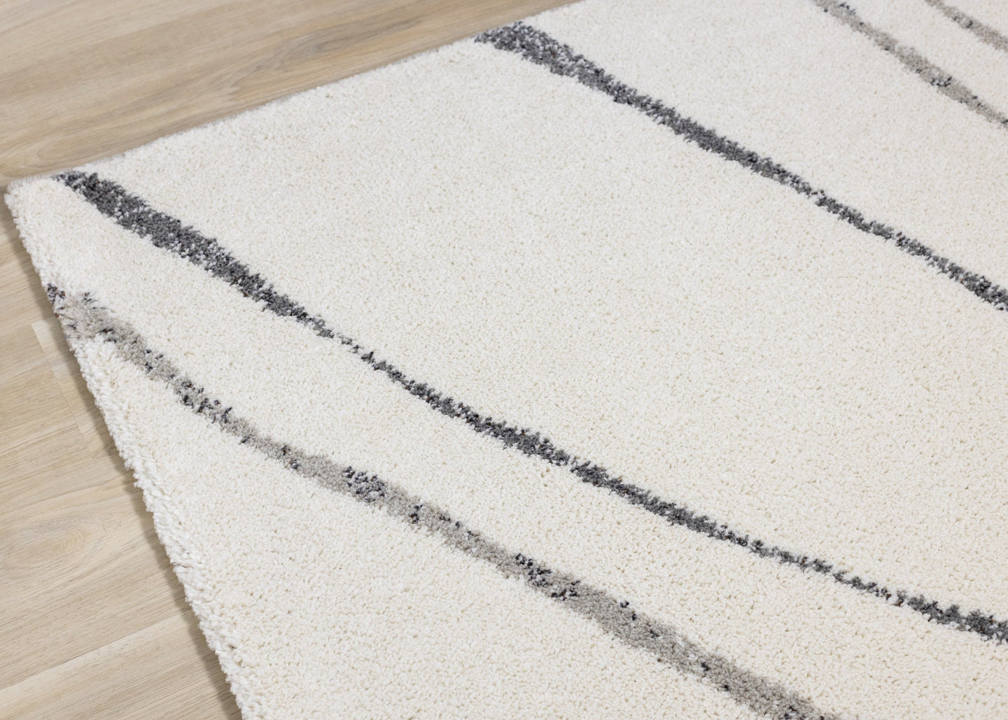 Ravine Cream Grey Wishbone Shag Rug - Furniture Depot