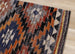 Sara Black Orange Bright Southwest Rug - Furniture Depot