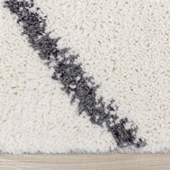 Ravine Cream Grey Wishbone Shag Rug - Furniture Depot