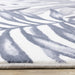 Intrigue Blue White Palm Fronds Plush Rug - Furniture Depot