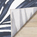 Intrigue Blue White Palm Fronds Plush Rug - Furniture Depot