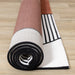 Claro White Black Orange Art Deco Geometric Plush Rug - Furniture Depot