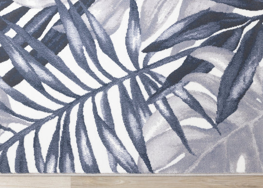 Intrigue Blue White Palm Fronds Plush Rug - Furniture Depot