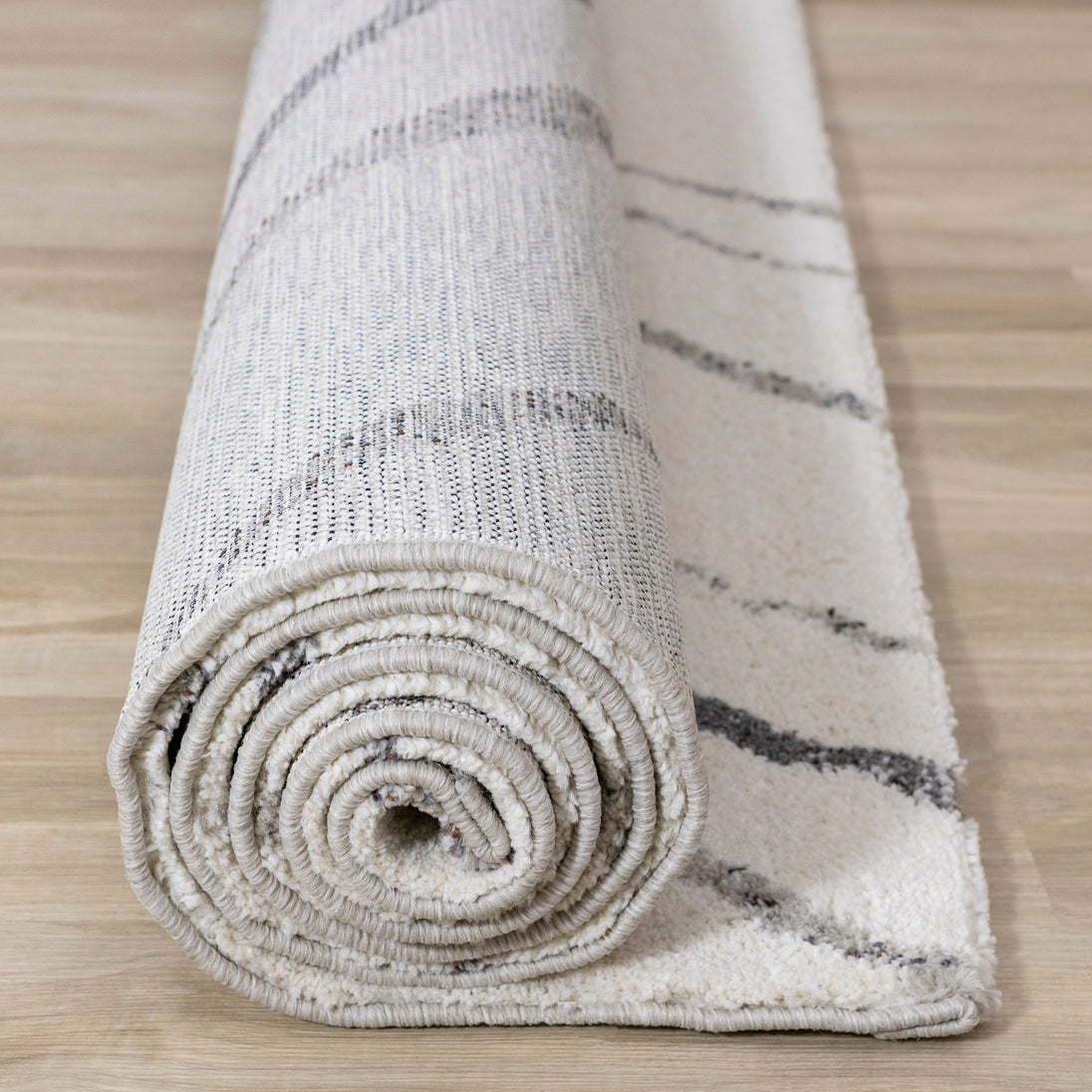 Ravine Cream Grey Wishbone Shag Rug - Furniture Depot