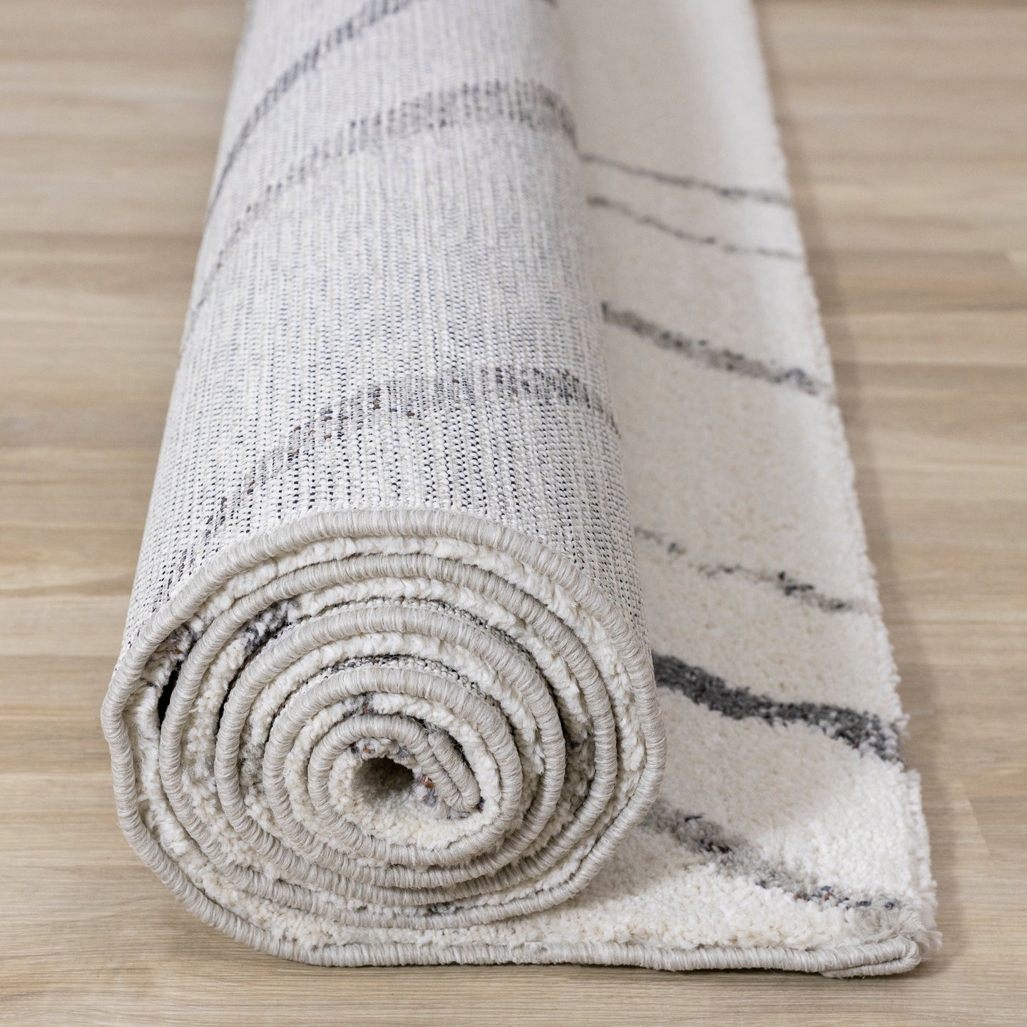 Ravine Cream Grey Wishbone Shag Rug - Furniture Depot