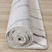 Ravine Cream Grey Wishbone Shag Rug - Furniture Depot