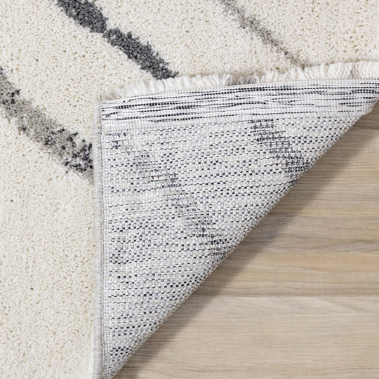 Ravine Cream Grey Wishbone Shag Rug - Furniture Depot